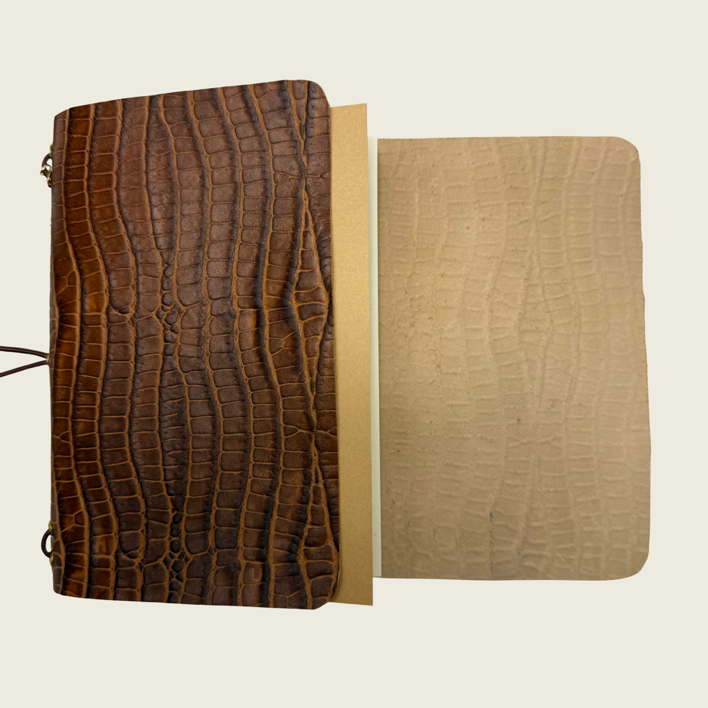Mini Leather Jigsaw A6 in a beautiful brown tone, unique and distinctive embossed leather