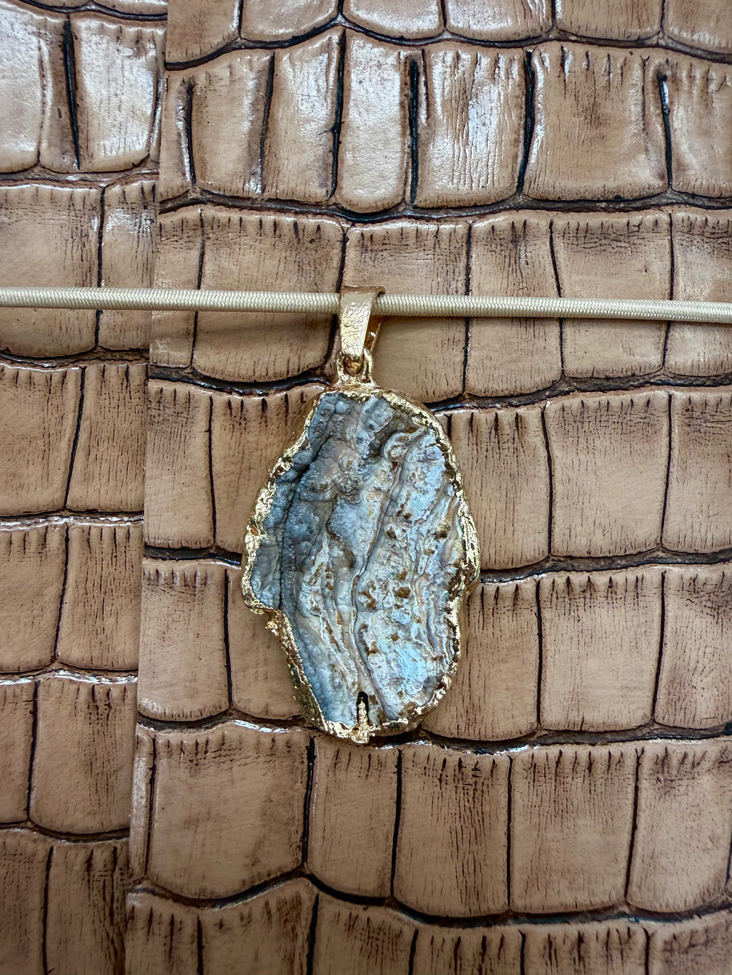 Warm Sand A5 embossed in a smooth sand colored leather with a soft, timeless elegance.