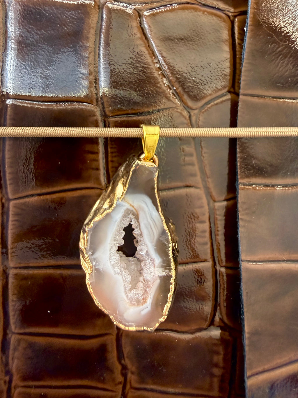 Mini Hot Fudge A6 brown patent leather finish, classy and elegant