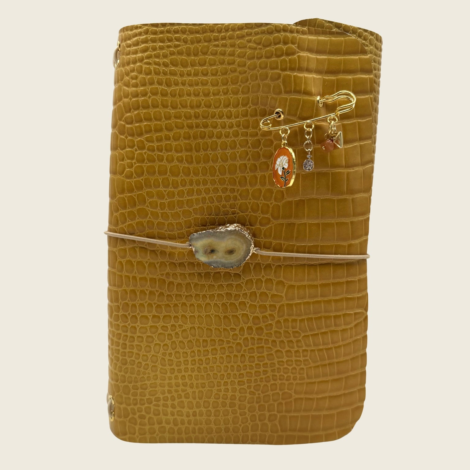 Amber glow A5 in rich caramel leather captures the warmth of sunlight tones organic beauty.