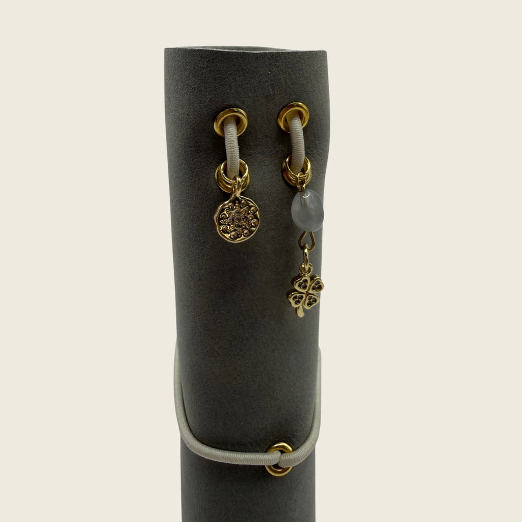 Mini Moonlight A6 Soft matte Greig leather, with a lace trace hand-punched dots. Timeless in luxury.