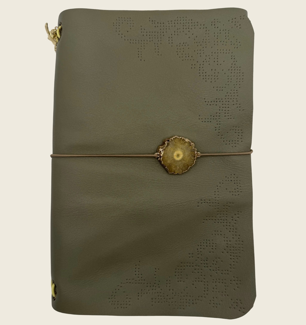 Soft olive A5 Delicate perforated pattern, with an ornamental touch. Smooth and refined, yet full of depth.
