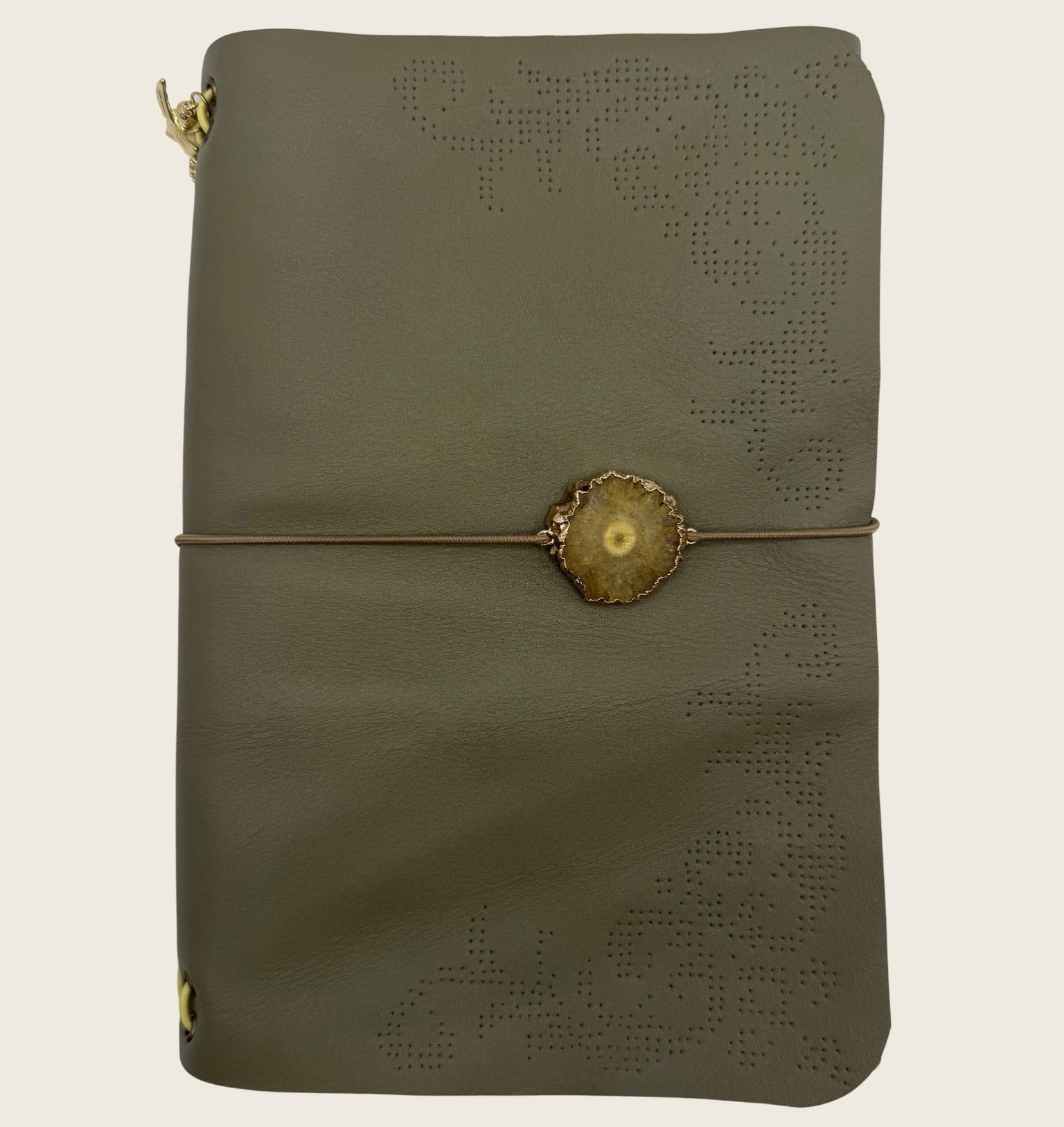 Soft olive A5 Delicate perforated pattern, with an ornamental touch. Smooth and refined, yet full of depth.