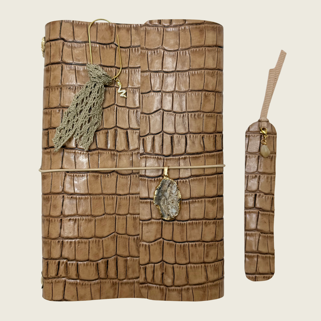 Warm Sand A5 embossed in a smooth sand colored leather with a soft, timeless elegance.