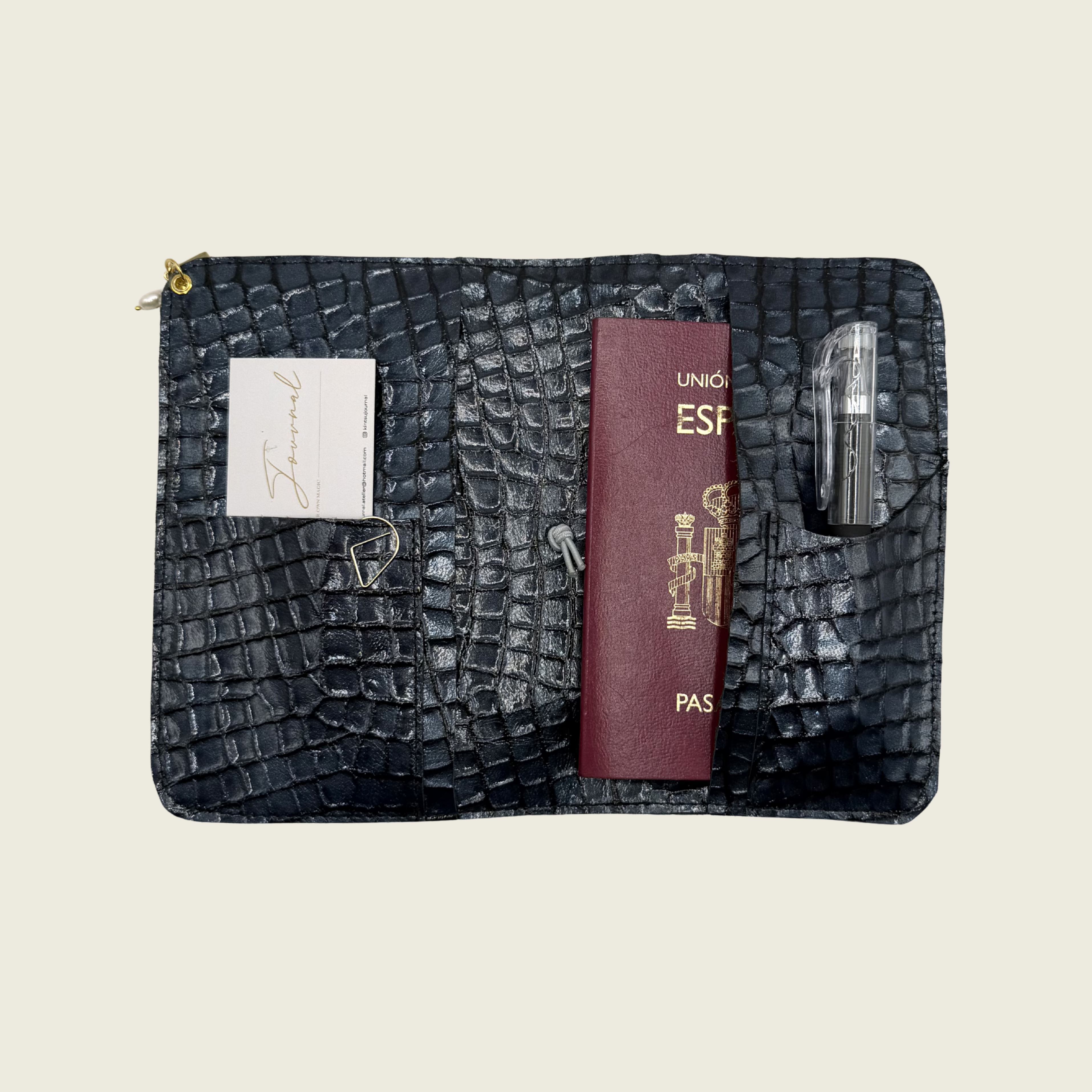 Deep midnigh blue, with embossed crocodile texture, timeless elegance.