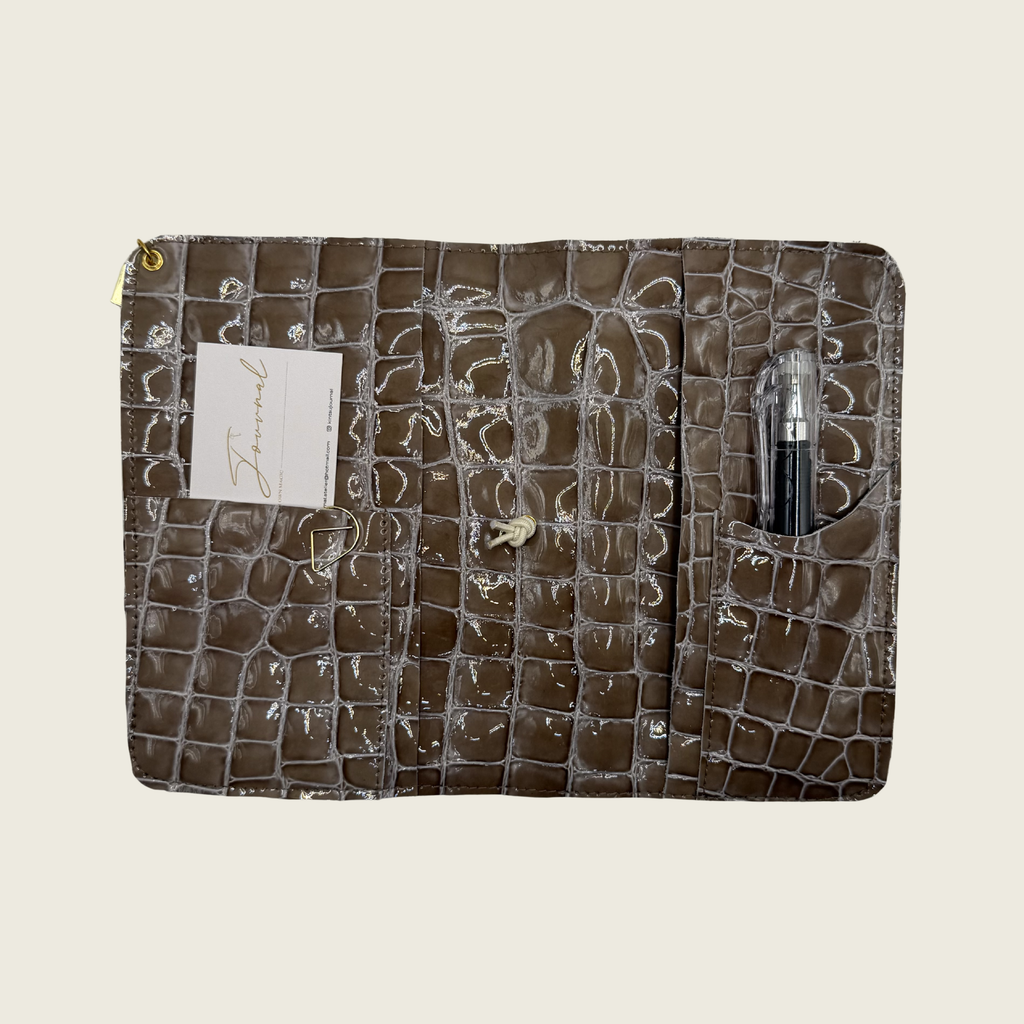 Soft taupe tone, patent leather, effortlessly elegant.
