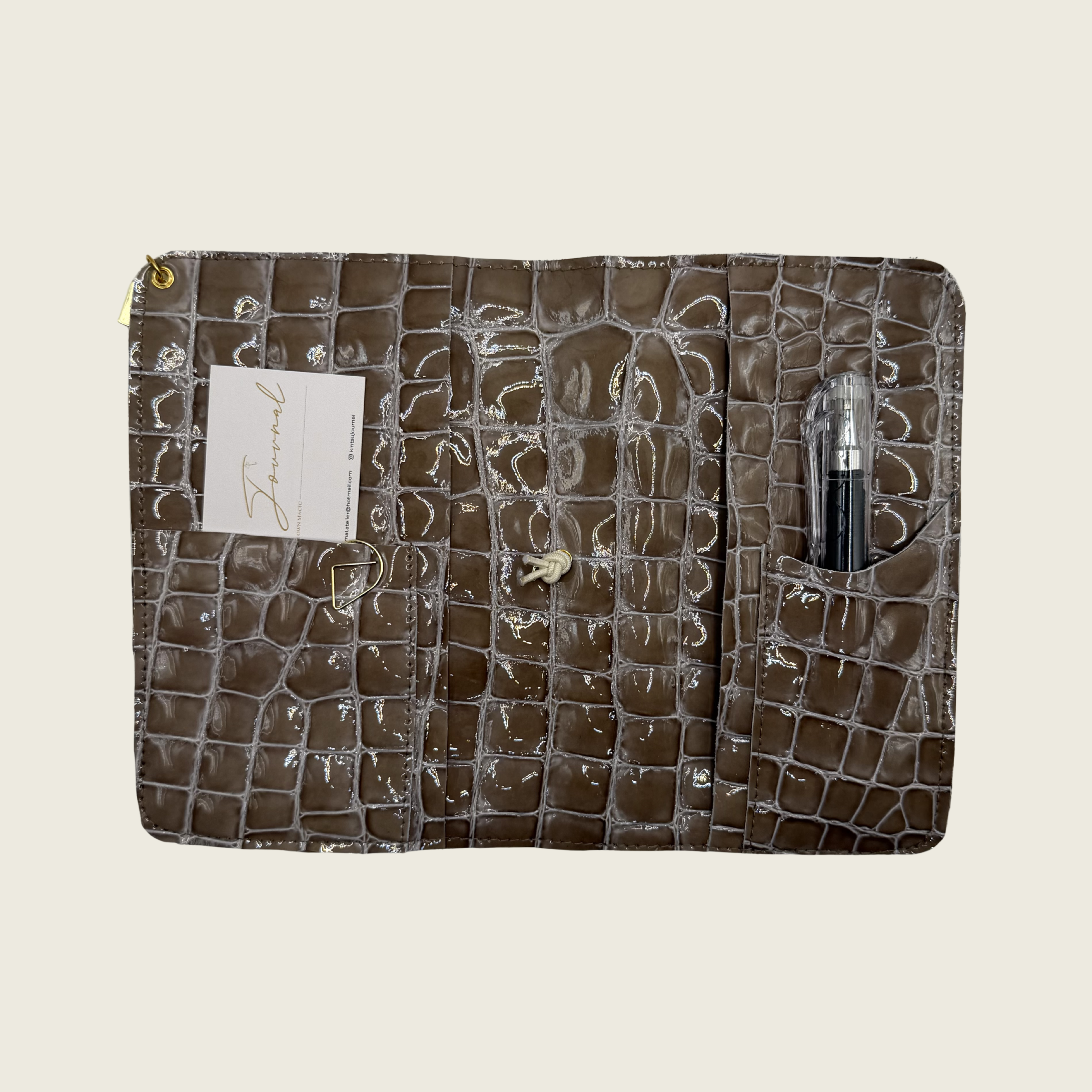 Soft taupe tone, patent leather, effortlessly elegant.