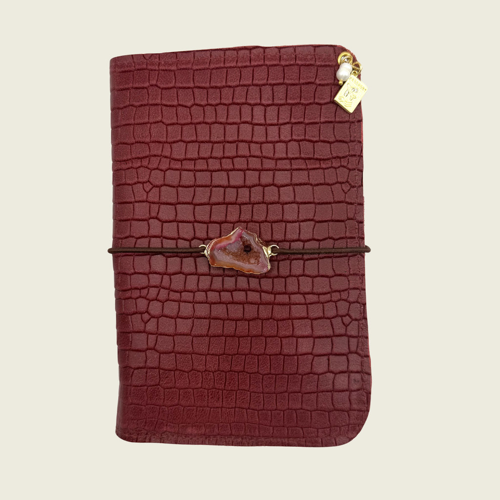 Deep crimson red, in embossed crocodile texture that radiates bold elegance.
