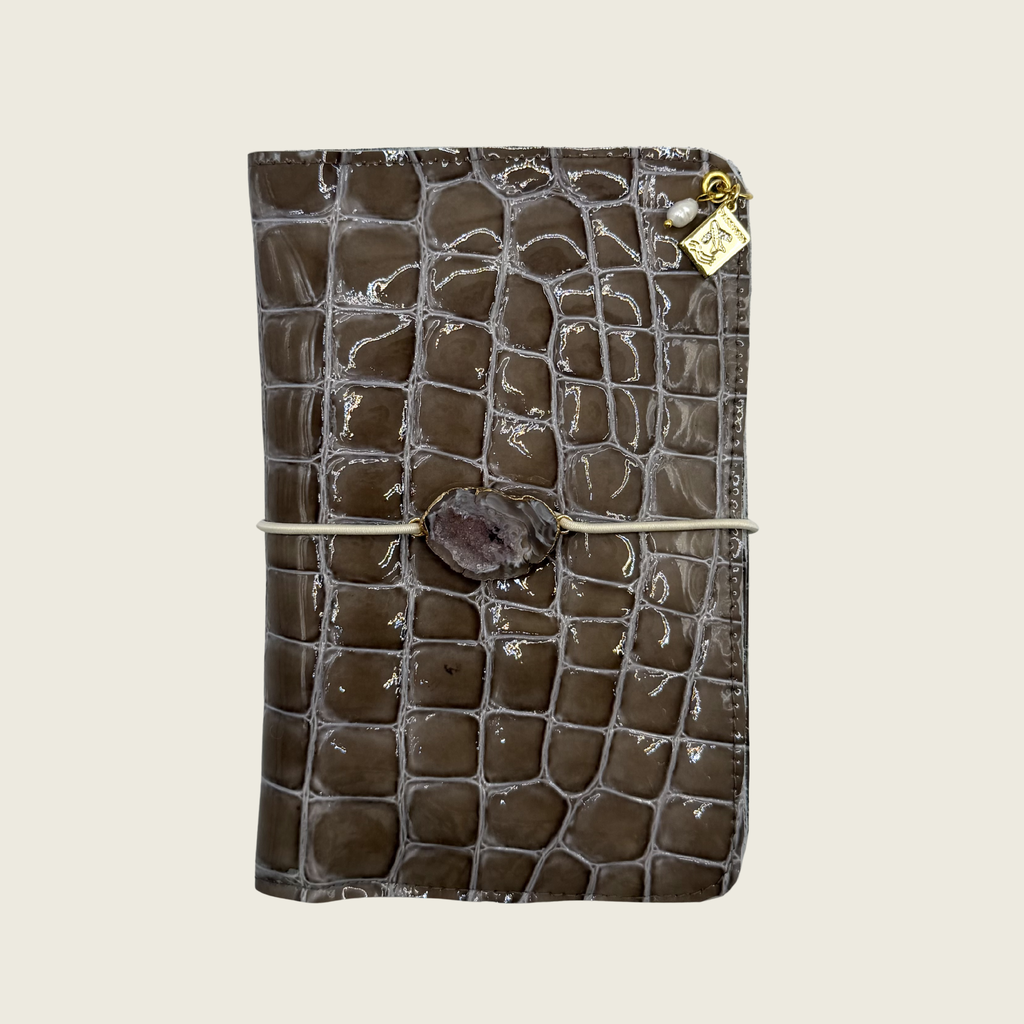 Soft taupe tone, patent leather, effortlessly elegant.
