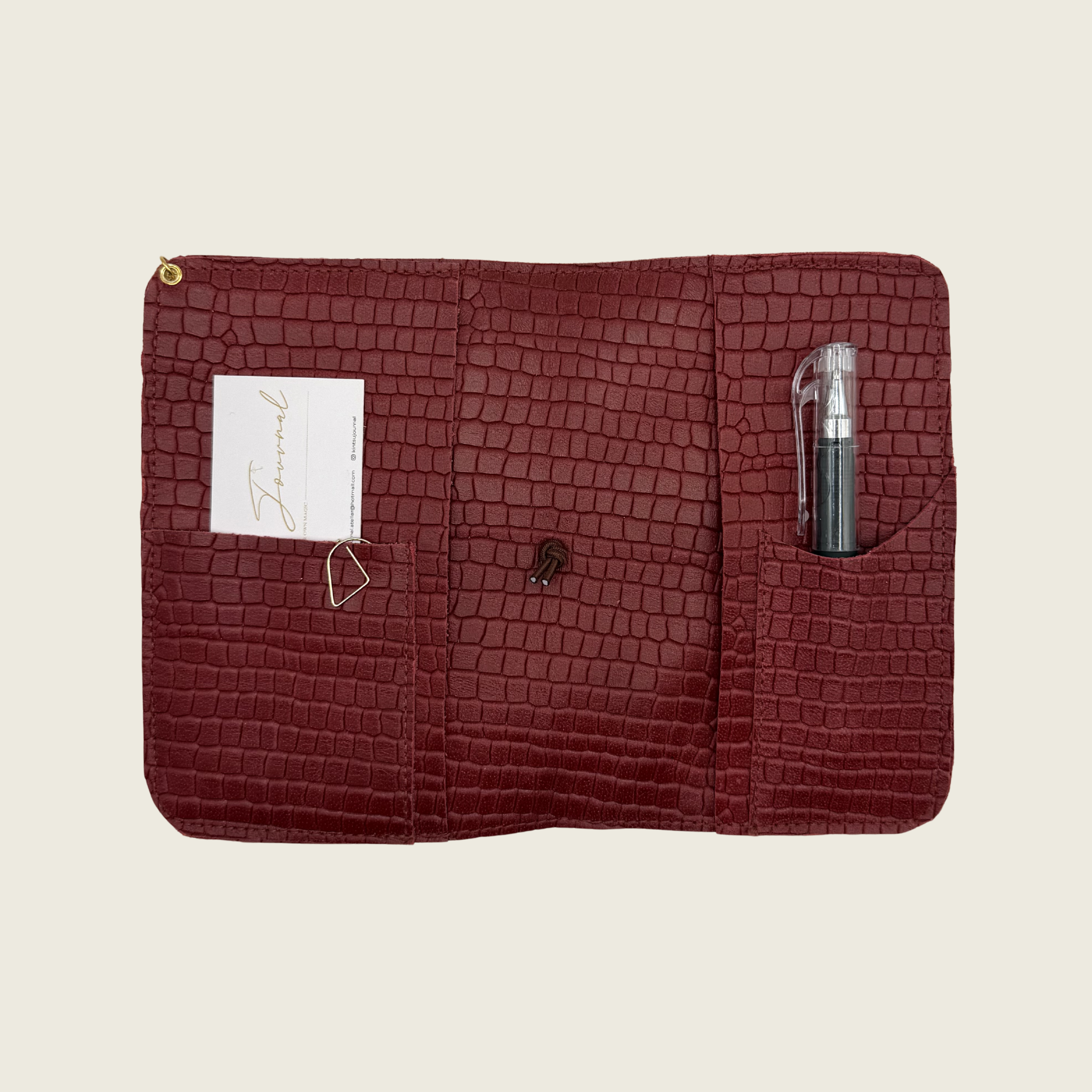 Deep crimson red, in embossed crocodile texture that radiates bold elegance.