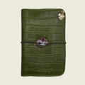 Luminous soft green moss, embossed in crocodile texture, distinctive elegance.