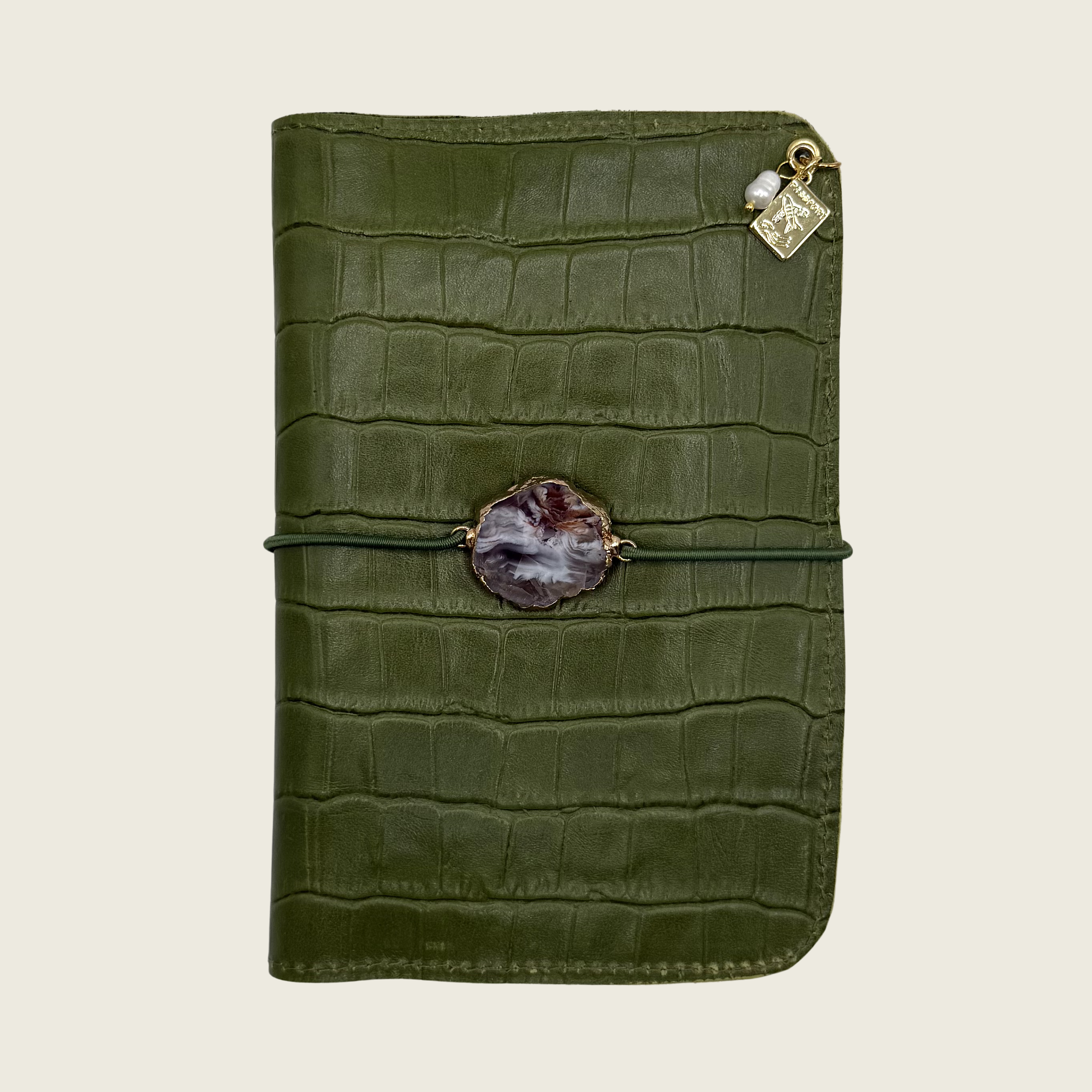 Luminous soft green moss, embossed in crocodile texture, distinctive elegance.